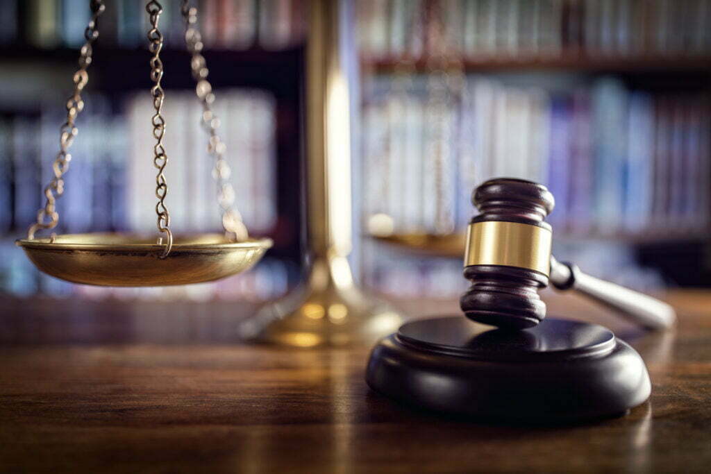 Scales of justice and gavel symbolizing legal resources and workers’ compensation system
