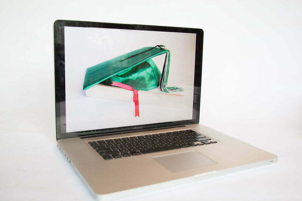 a laptop with a green umbrella