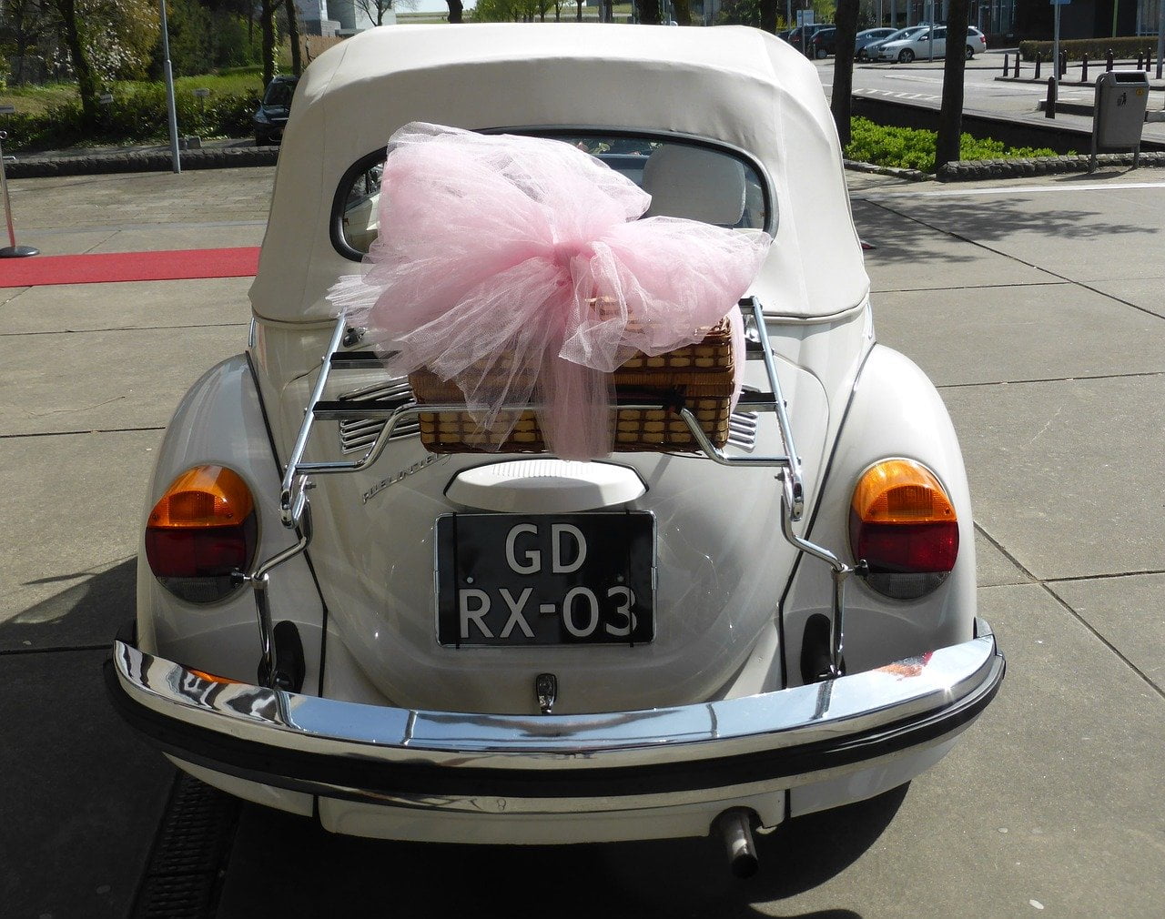 a car with a pink elephant head