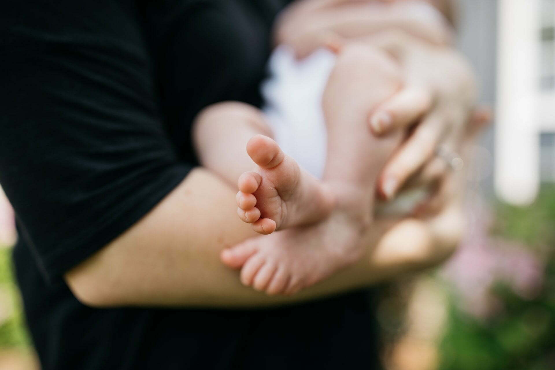 a person holding a baby