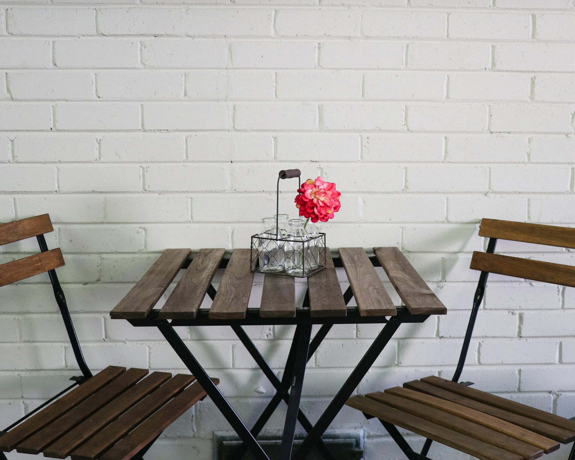 a table with a flower on it