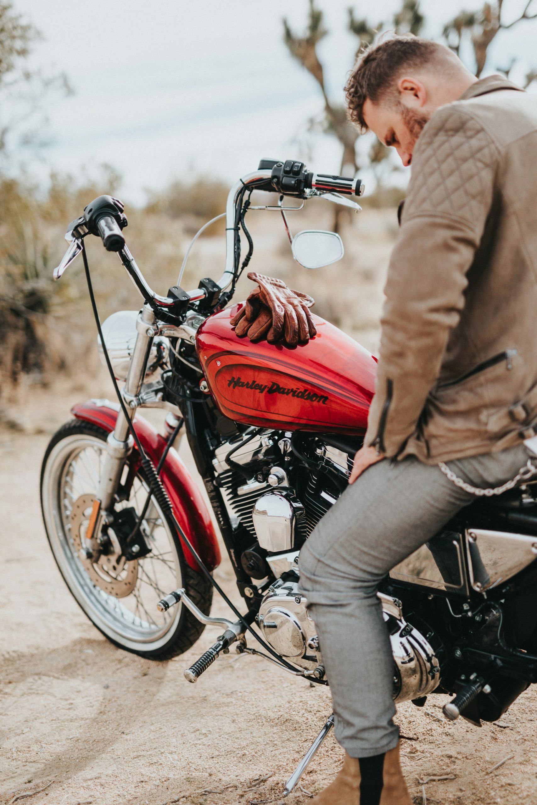 a person sitting on a motorcycle