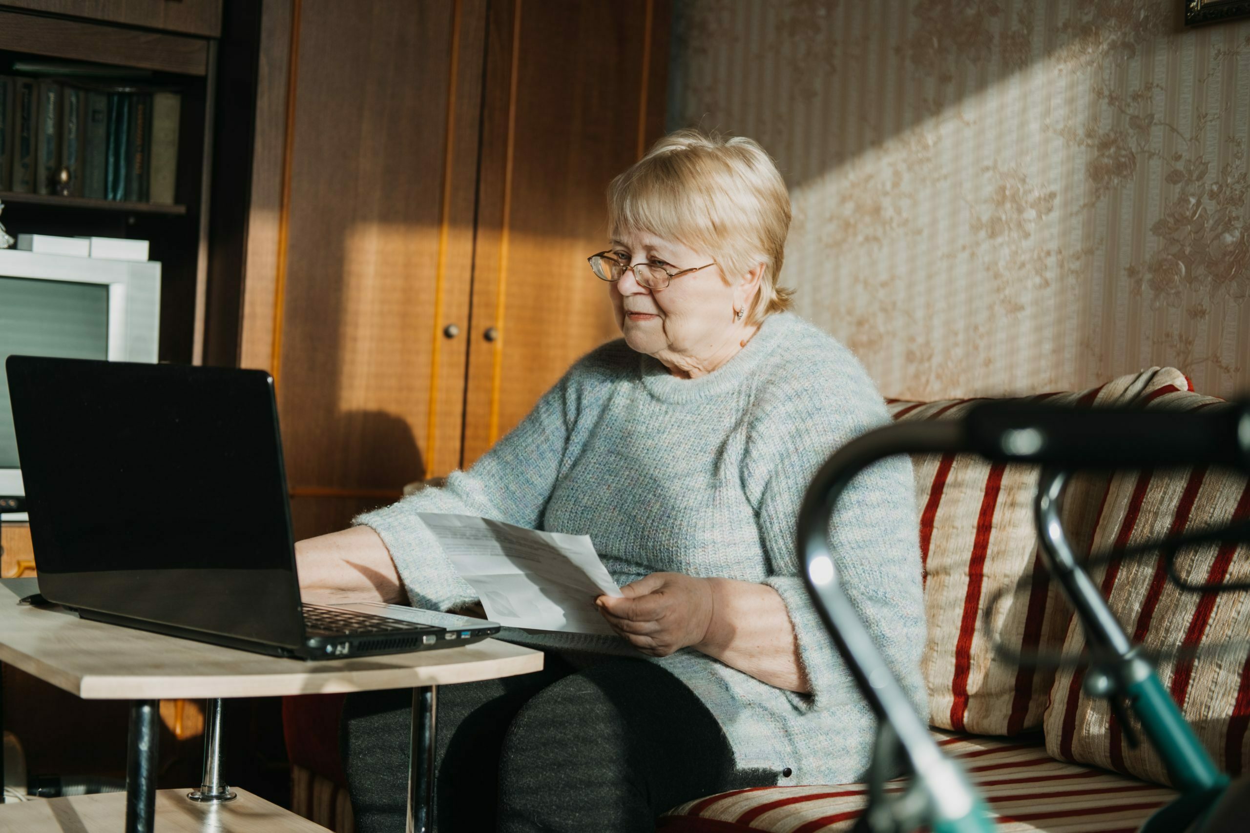 older woman going over paperwork