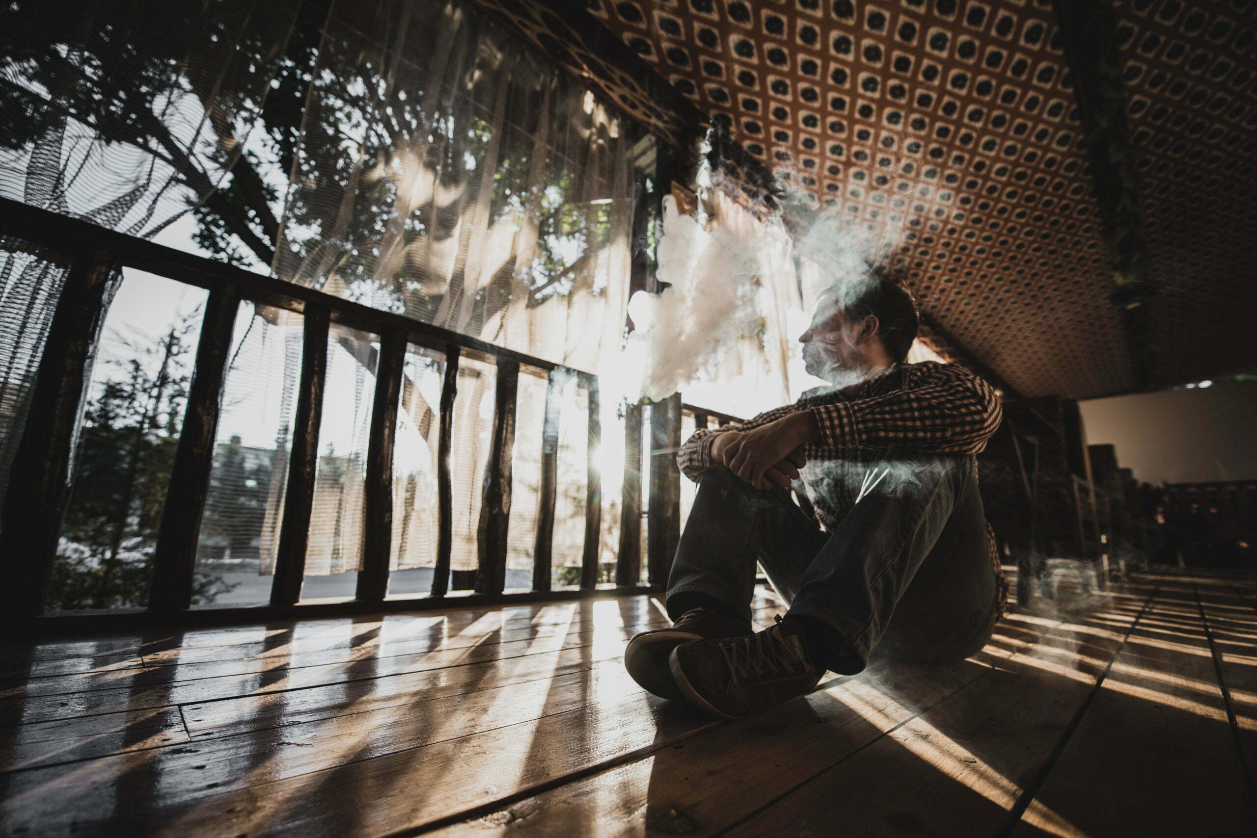 YOUNG MAN SMOKING