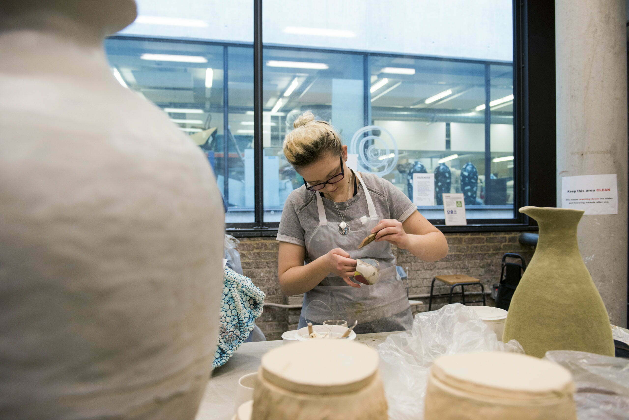 WOMAN DOING POTTERY